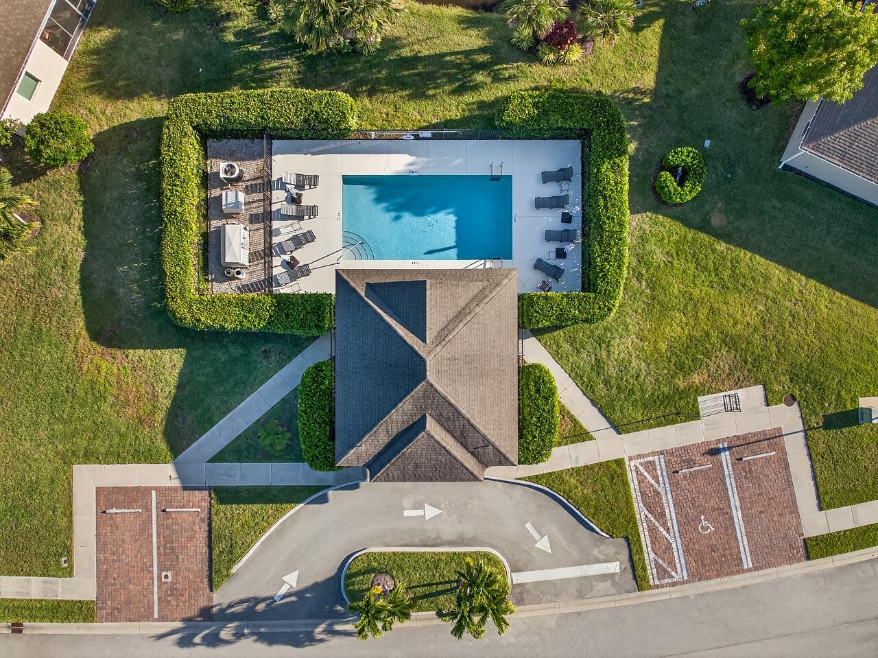 313 Sandcrest Circle Sebastian, FL 32958 - Photo 40 of 42 an aerial view of a house with swimming pool and garden