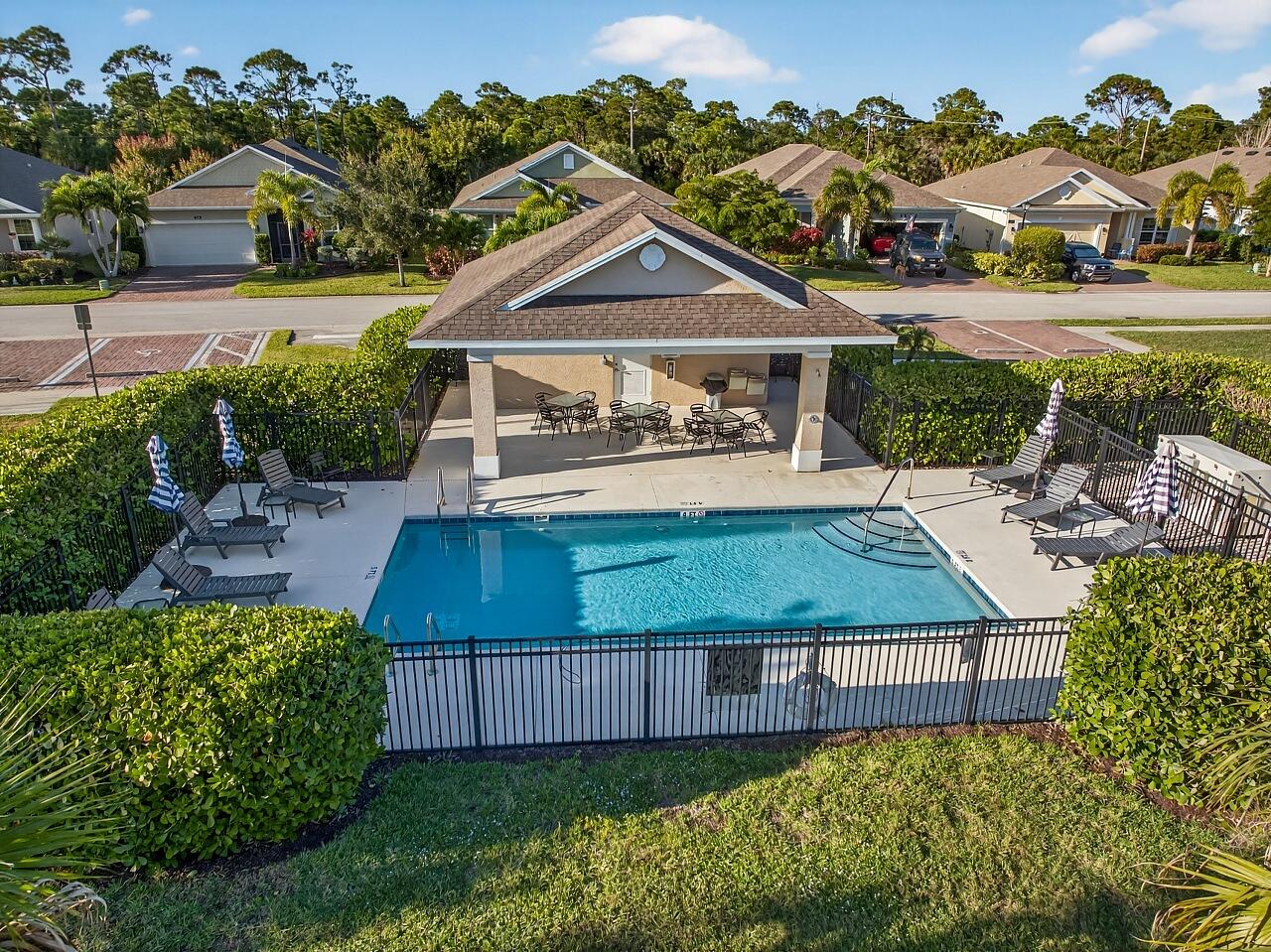 313 Sandcrest Circle Sebastian, FL 32958 - Photo 41 of 42 a view of a house with garden
