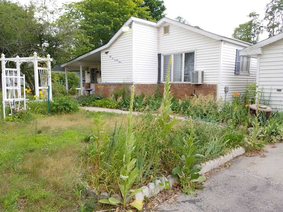 5673 Vinton Road Williamsburg, MI 49690 - Photo 2 of 12 1850134-1.JPG
