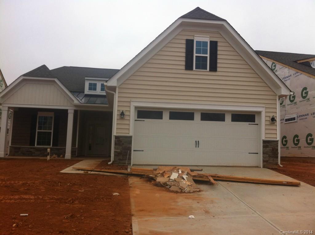 4266 Perth Road, Unit 311 Indian Land, SC 29707 - Photo 1 of 12 a front view of a house with a garage