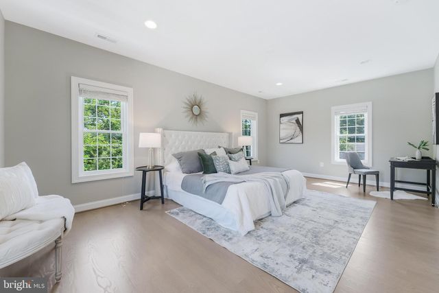 a bed room with a bed and a couch