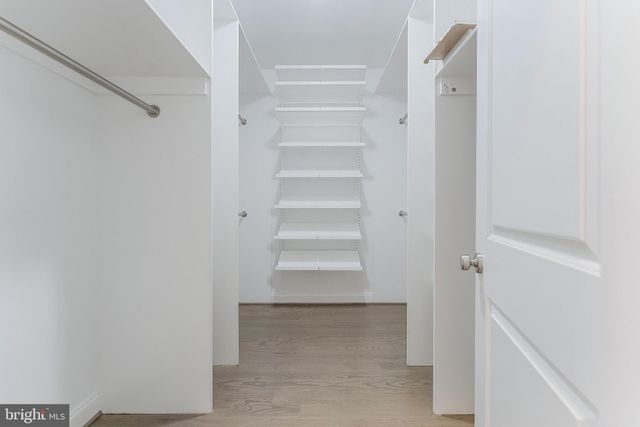 a view of an empty walk in closet