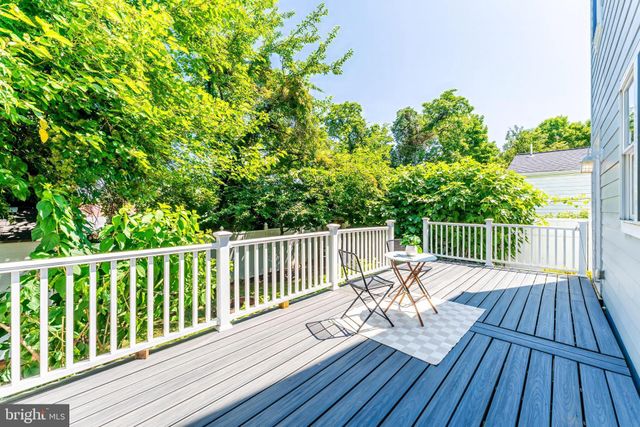 a view of balcony with furniture
