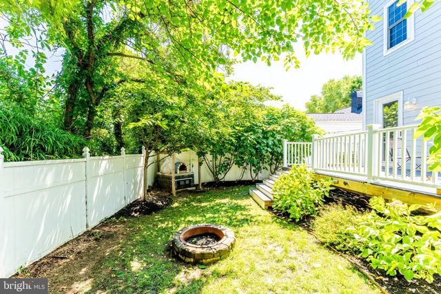 a view of a backyard with garden