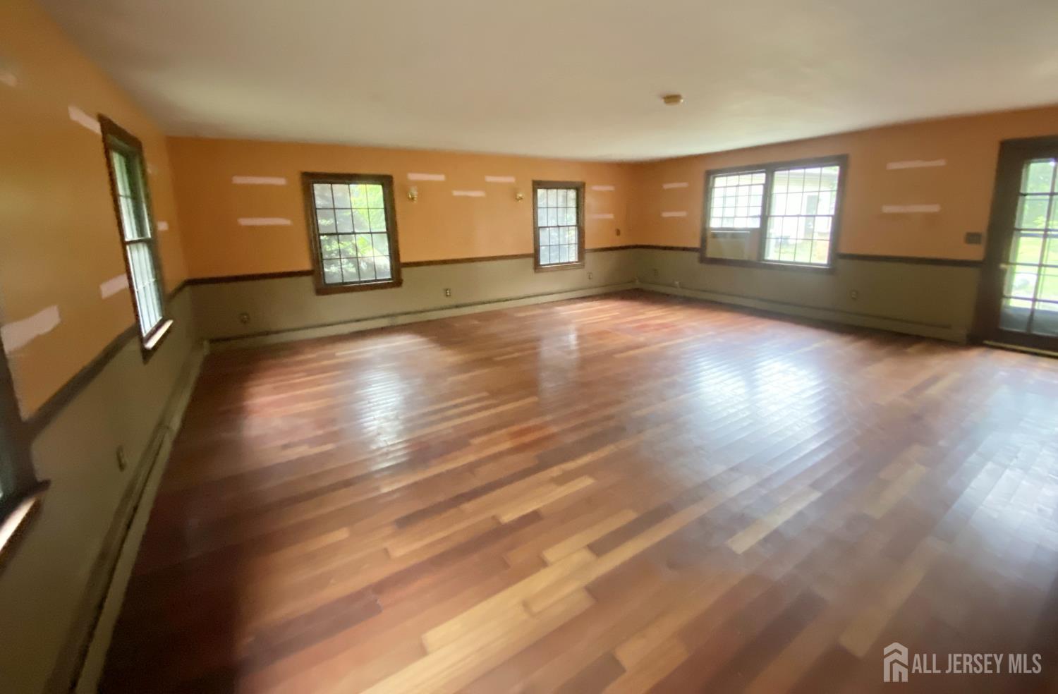 143 Back Brook Road Ringoes, NJ 08551 - Photo 24 of 25 a view of an empty room with wooden floor and a window