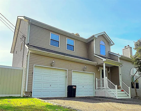 a view of a house with a garage