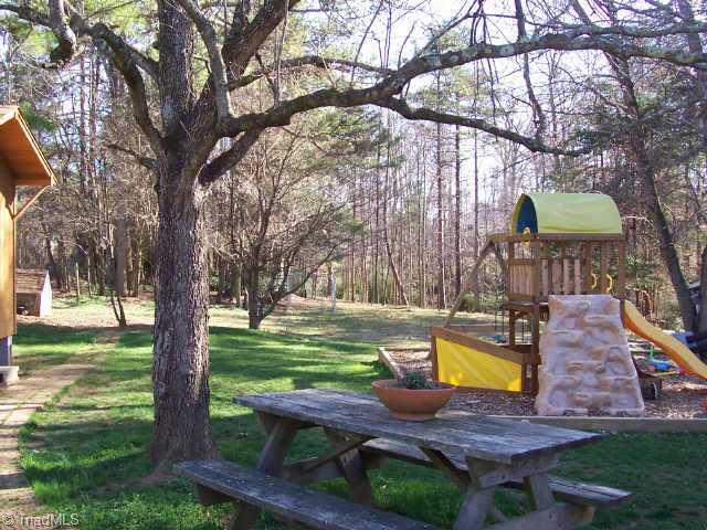 310 Summit Road High Point, NC 27265 - Photo 2 of 9 Other. The playground equipment stays in this deep, deep back yard that ends just beyond the creek--adding up to .99 Acres!