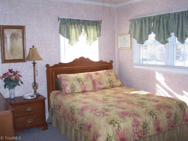 310 Summit Road High Point, NC 27265 - Photo 6 of 9 Other. Enjoy the light, bright feeling in the master bedroom, framed by corner windows.