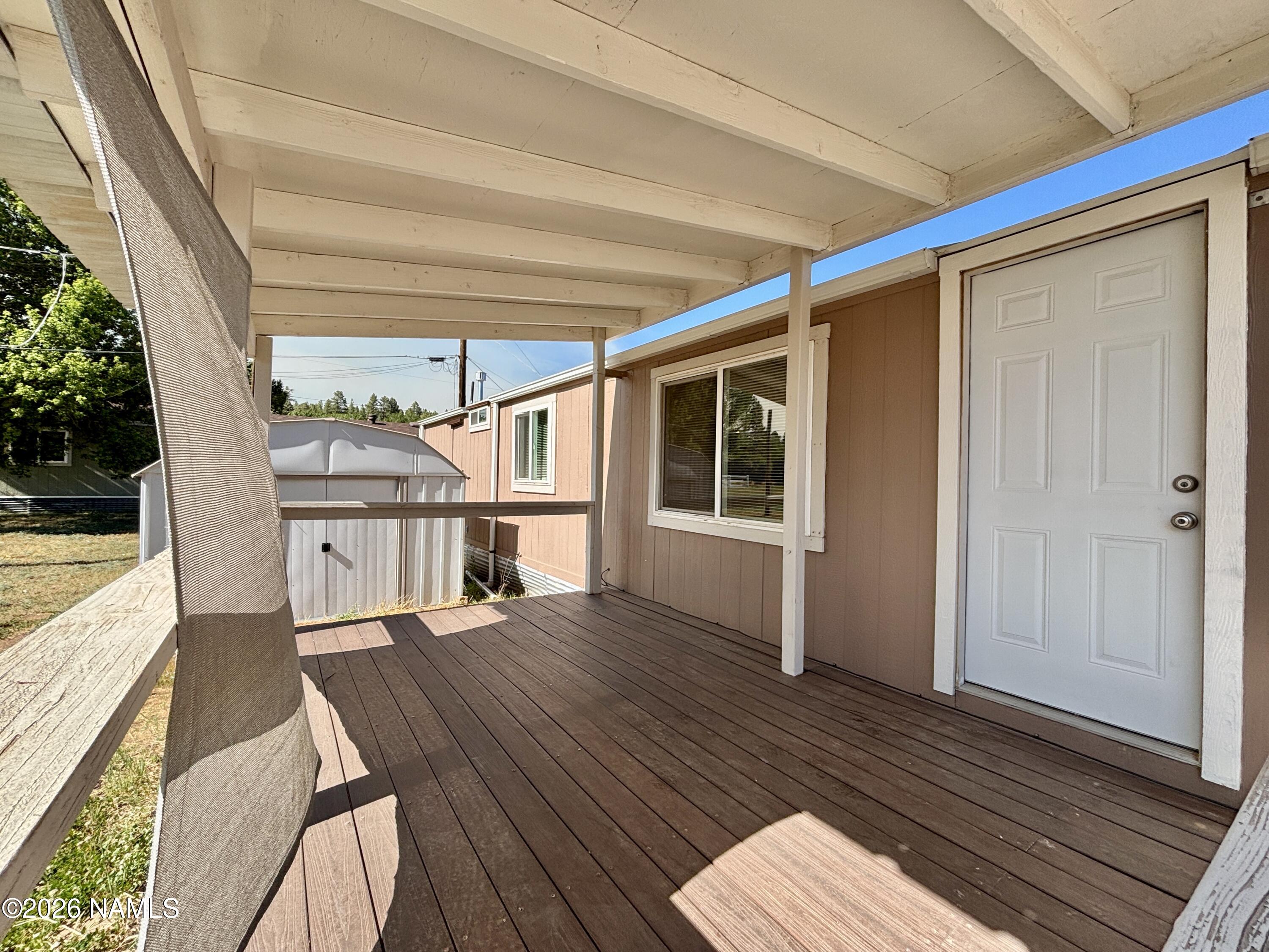 4805 South Thorn Road, Unit 1 Flagstaff, AZ 86005 - Photo 3 of 21 Inviting Porch with Composite Decking