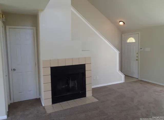 a room with a fireplace