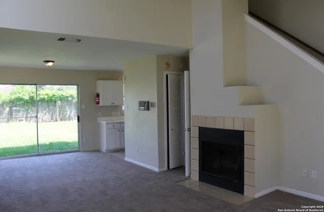 a view of empty room with front door