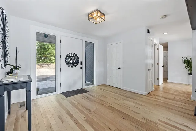 a view of an entryway wooden floor