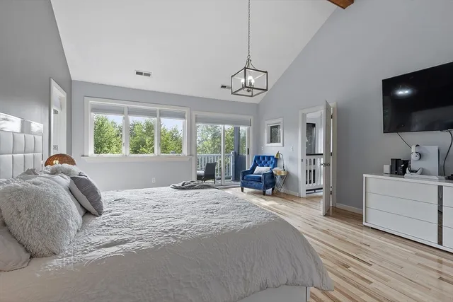 a bathroom with double sink and a mirror