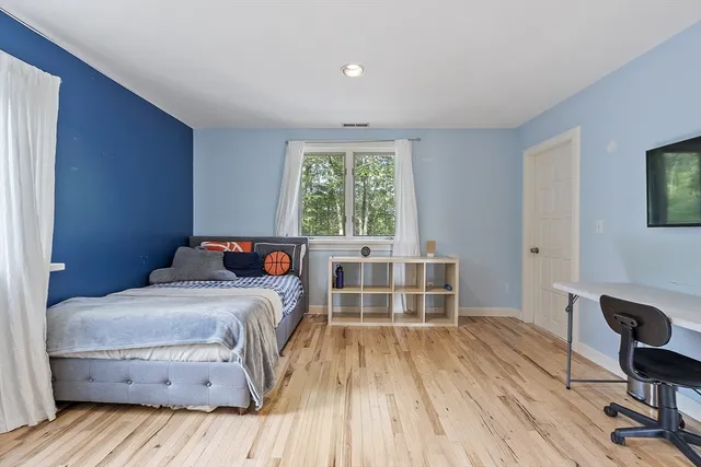 a bathroom with a toilet sink a shower and