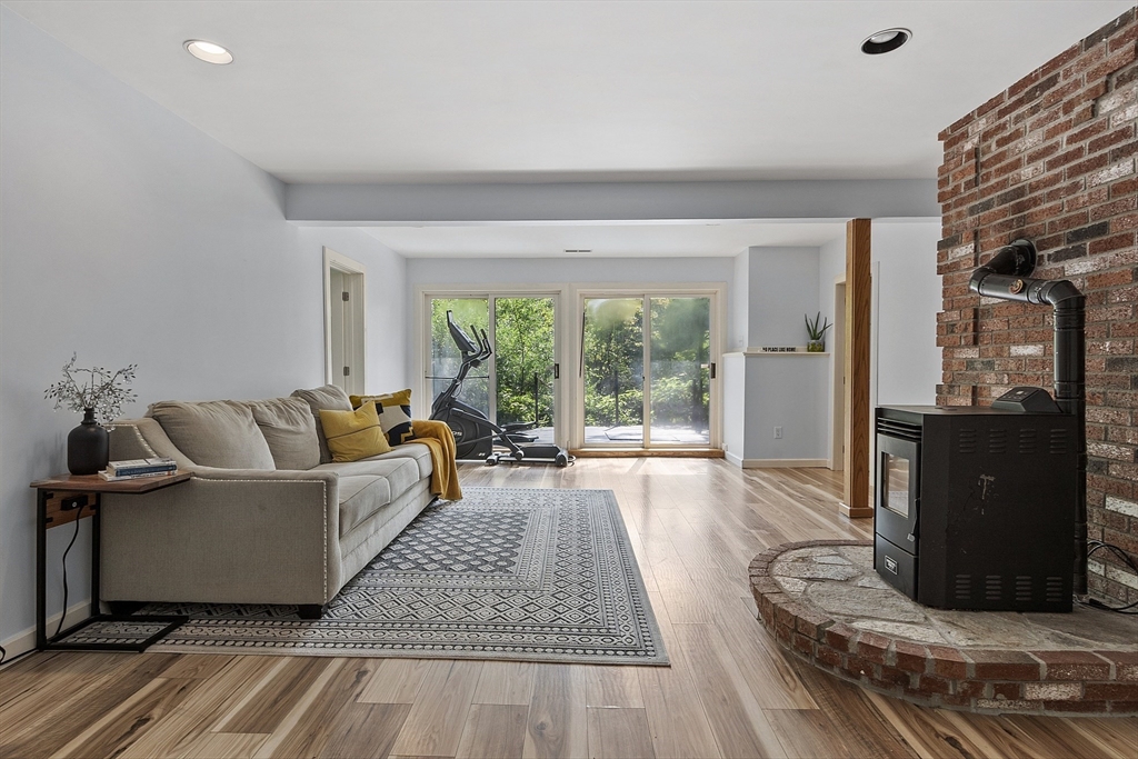 7 Birch Hill Road Pepperell, MA 01463 - Photo 31 of 42 a living room with furniture and a window