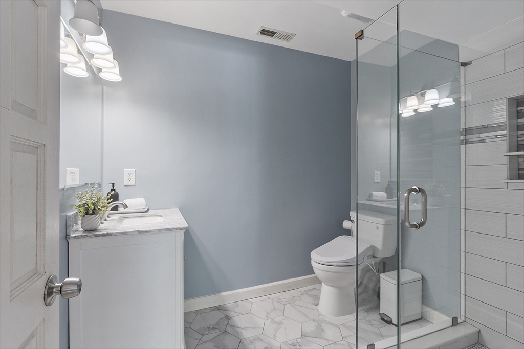 7 Birch Hill Road Pepperell, MA 01463 - Photo 32 of 42 a bathroom with a sink toilet and shower