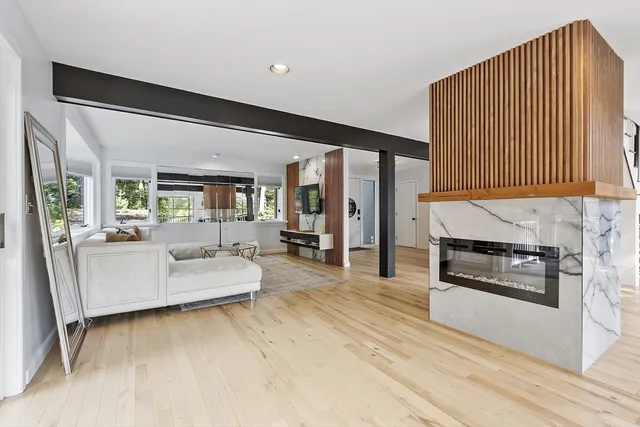 a outdoor space with furniture and wooden floor