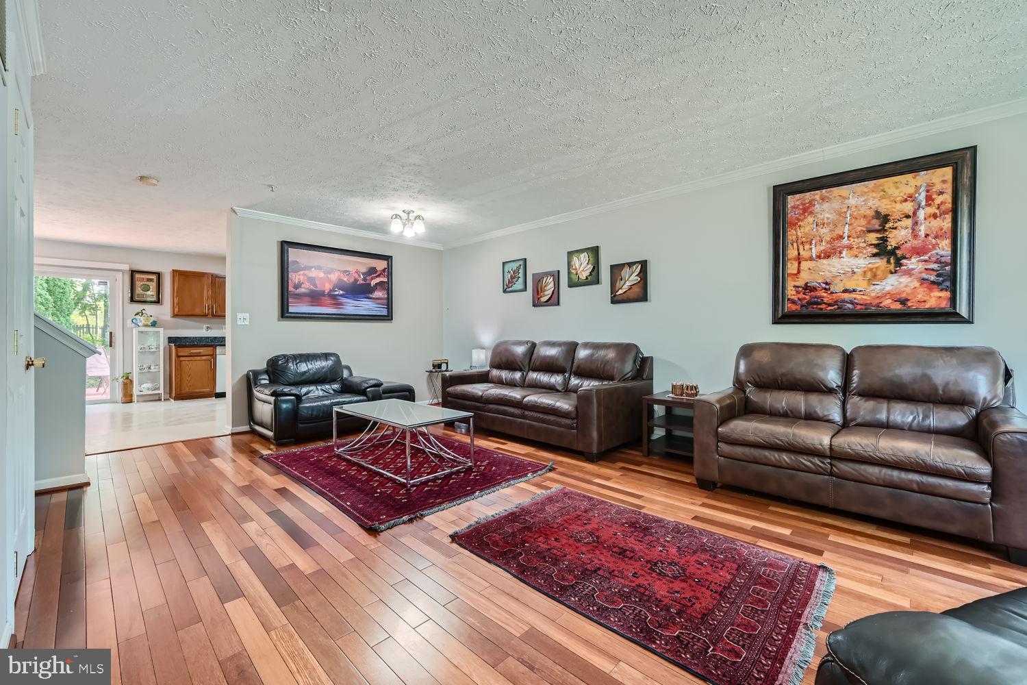 107 Carolstowne Road Reisterstown, MD 21136 - Photo 6 of 28 Brazilian Cherry Wood Flooring in Living Room