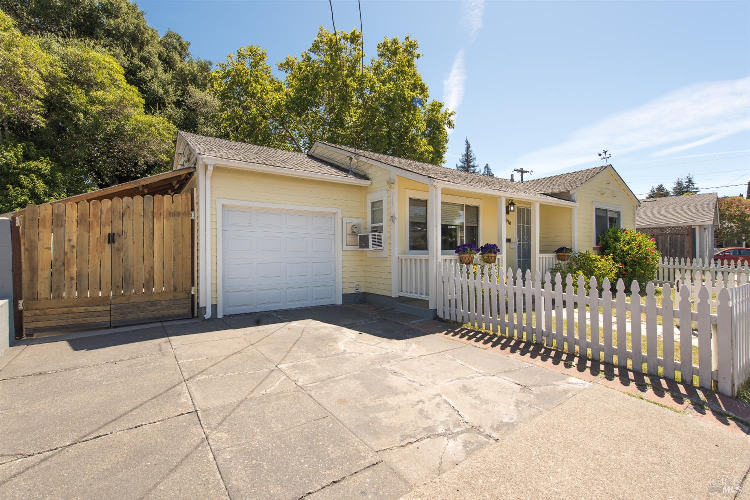 Street view with garage and extra storage view