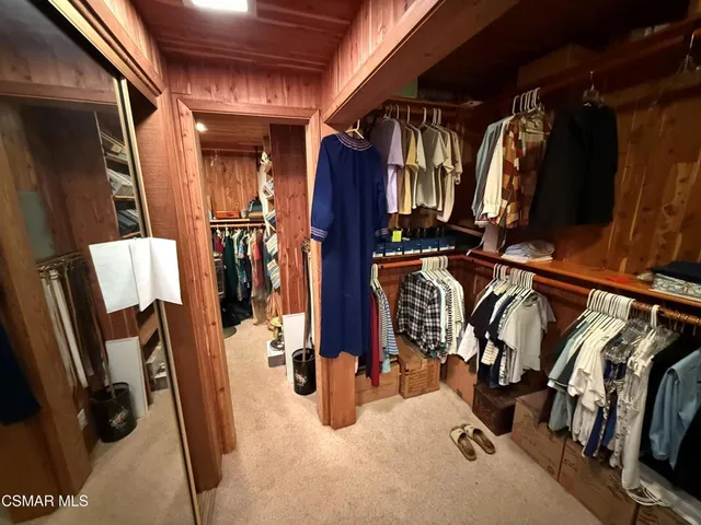 a spacious bathroom with a sink toilet and shower