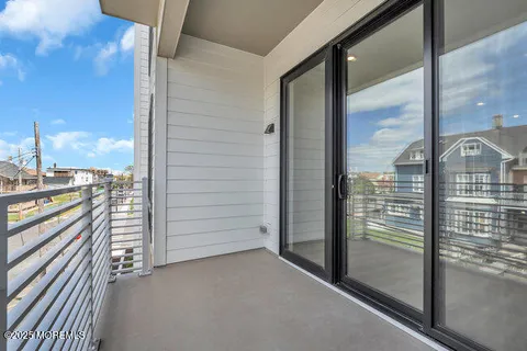 a view of a walk in closet and window