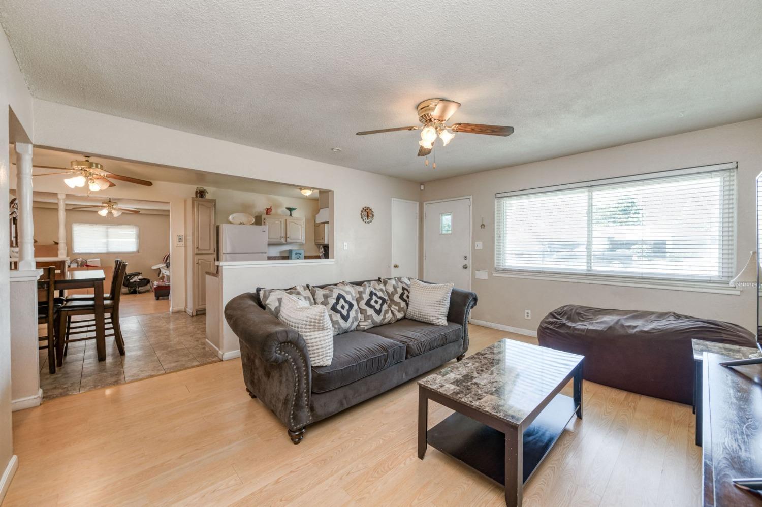 1325 Terry Avenue Clovis, CA 93612 - Photo 6 of 28 a living room with furniture and a window