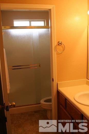 7550 Whimbleton Way Reno, NV 89511 - Photo 11 of 15 a bathroom with a shower