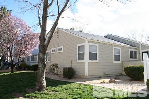 7550 Whimbleton Way Reno, NV 89511 - Photo 12 of 15 a view of a house with a yard