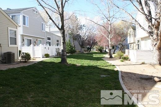 7550 Whimbleton Way Reno, NV 89511 - Photo 14 of 15 a backyard of a house with a large tree