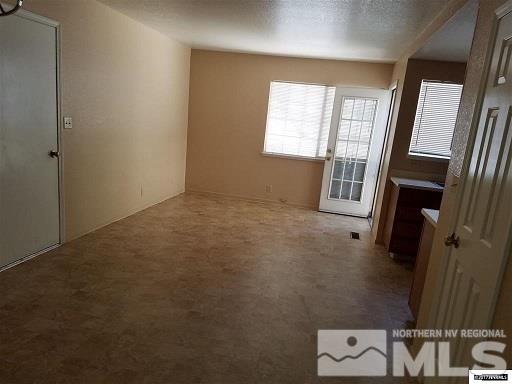7550 Whimbleton Way Reno, NV 89511 - Photo 6 of 15 an empty room with windows