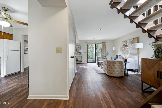 a living room with furniture and a table