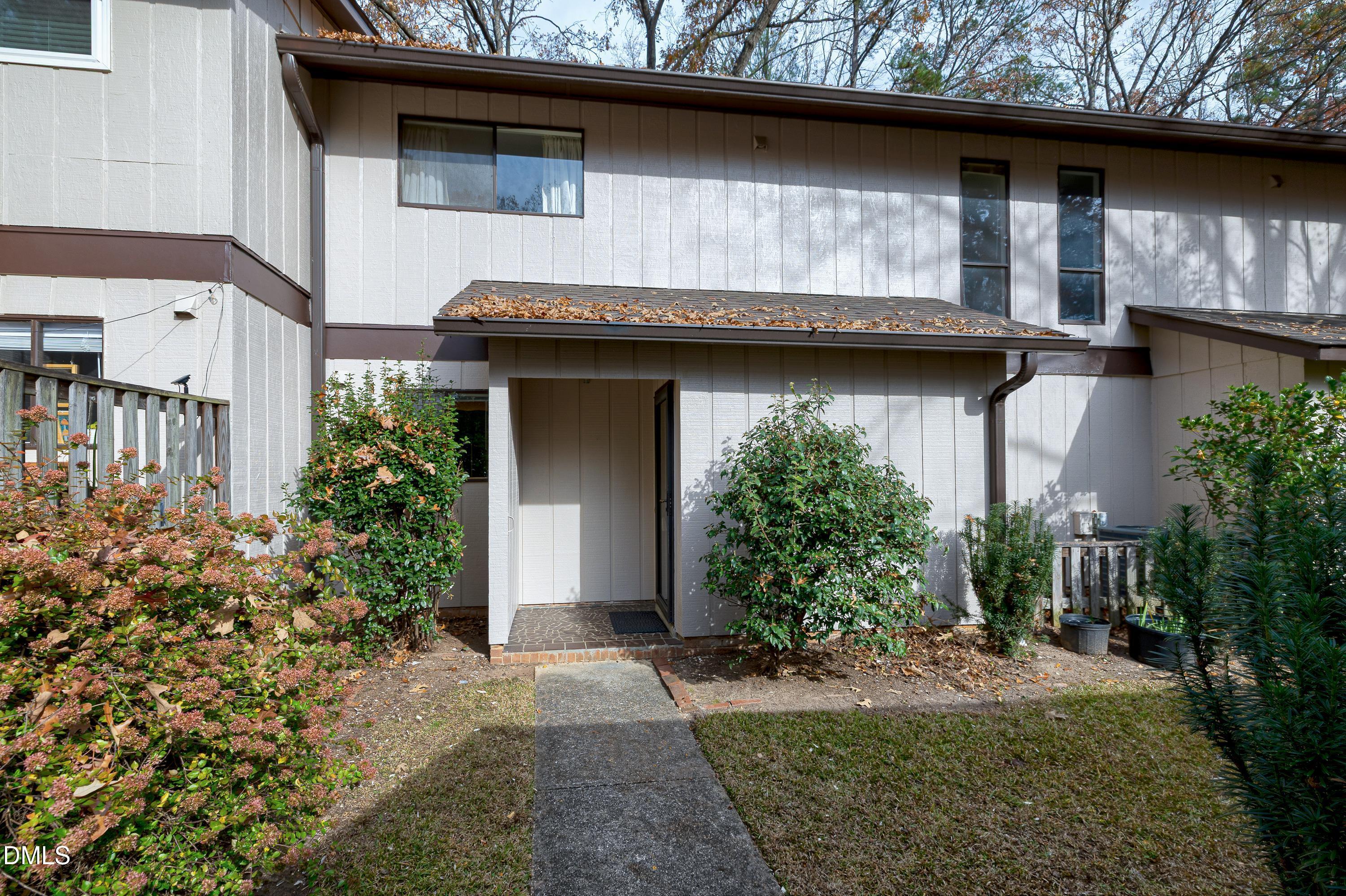 3905 Wendy Lane Raleigh, NC 27606 - Photo 2 of 42 a front view of a house with garden
