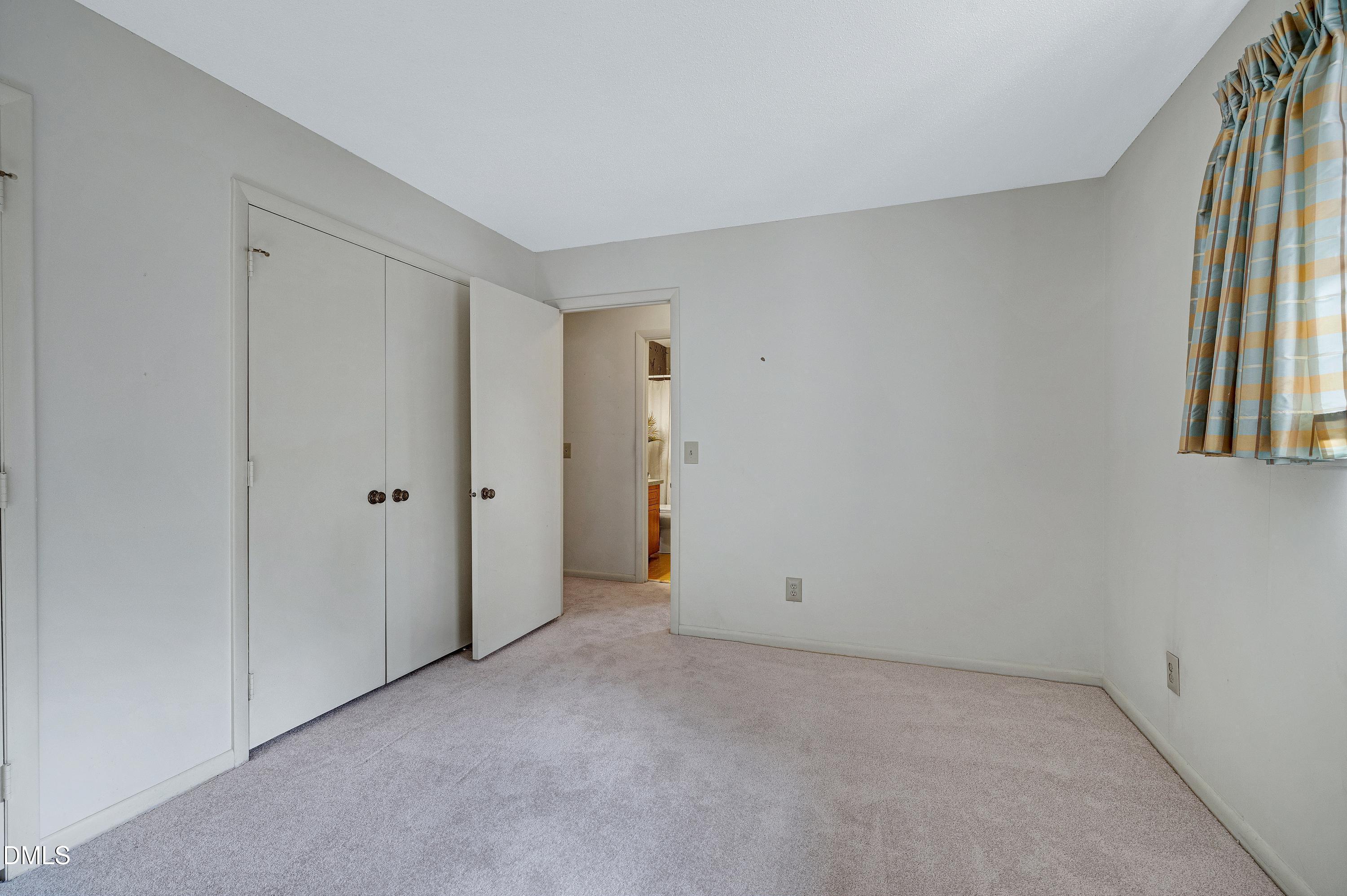 3905 Wendy Lane Raleigh, NC 27606 - Photo 29 of 42 a view of an empty room with a window