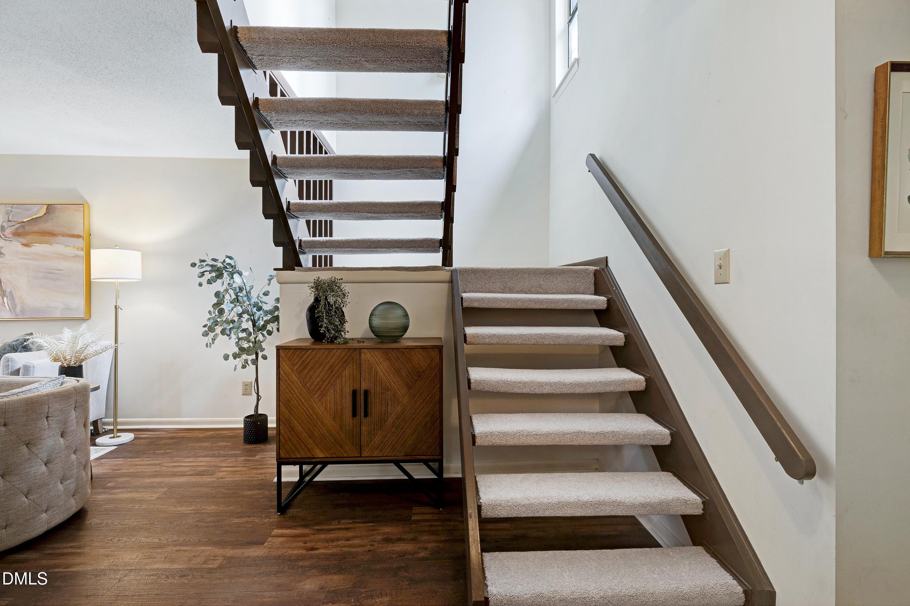 3905 Wendy Lane Raleigh, NC 27606 - Photo 32 of 42 a view of entryway and hall with wooden floor