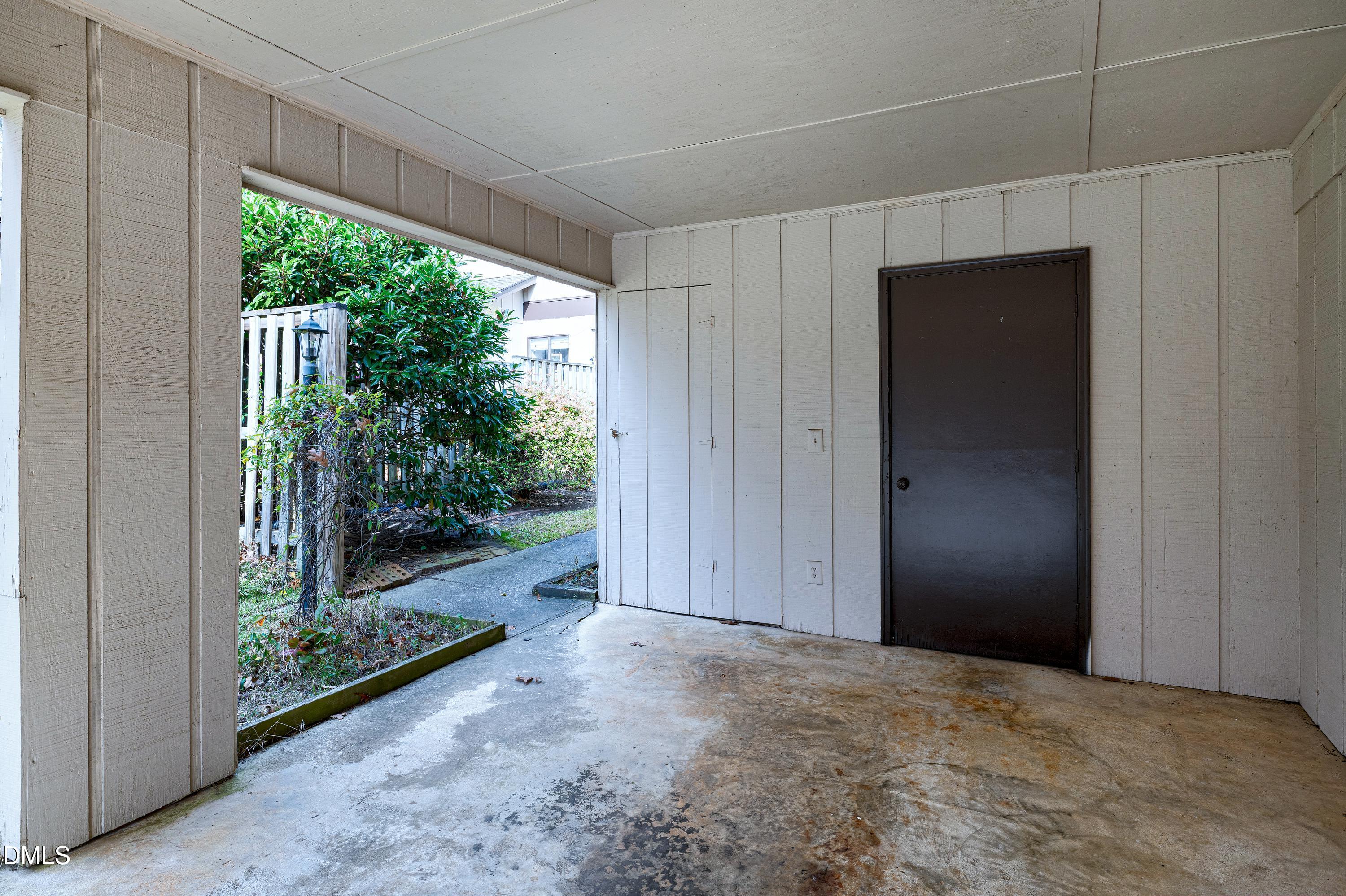 3905 Wendy Lane Raleigh, NC 27606 - Photo 37 of 42 a view of a room with wooden floor and garden