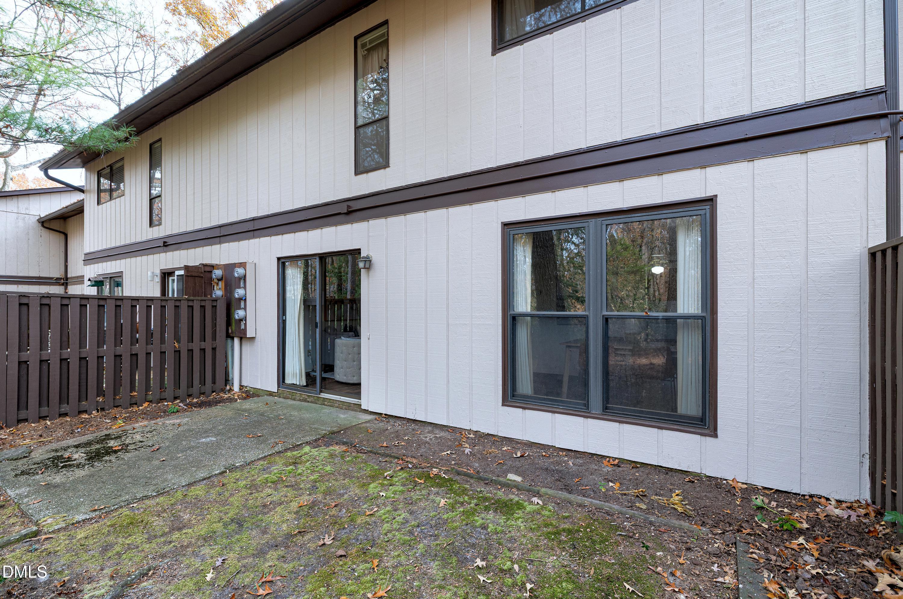 3905 Wendy Lane Raleigh, NC 27606 - Photo 39 of 42 a front view of a house with a garage