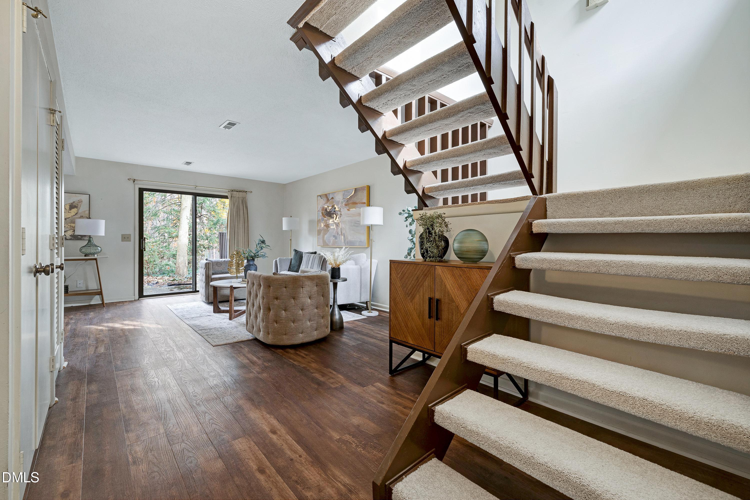 3905 Wendy Lane Raleigh, NC 27606 - Photo 5 of 42 a living room with furniture and hard wood flooring