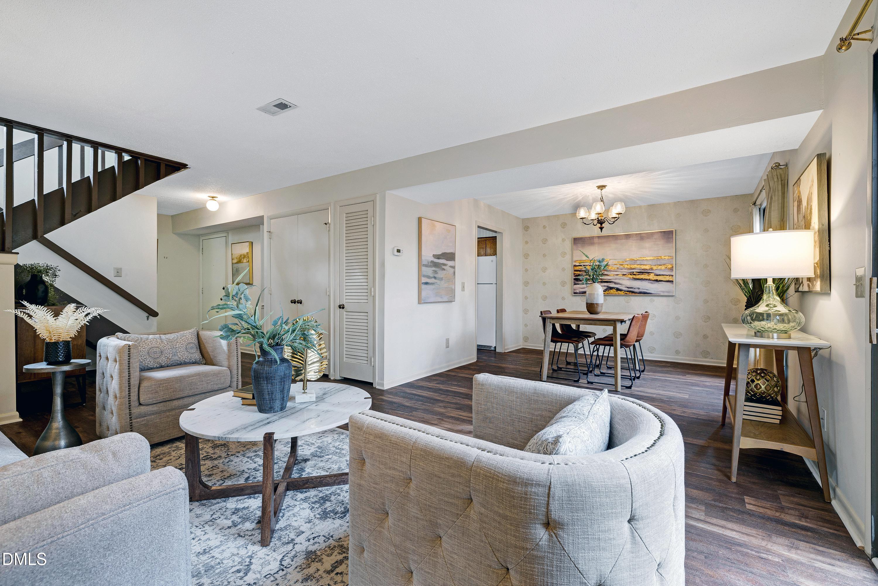 3905 Wendy Lane Raleigh, NC 27606 - Photo 7 of 42 a living room with furniture and wooden floor