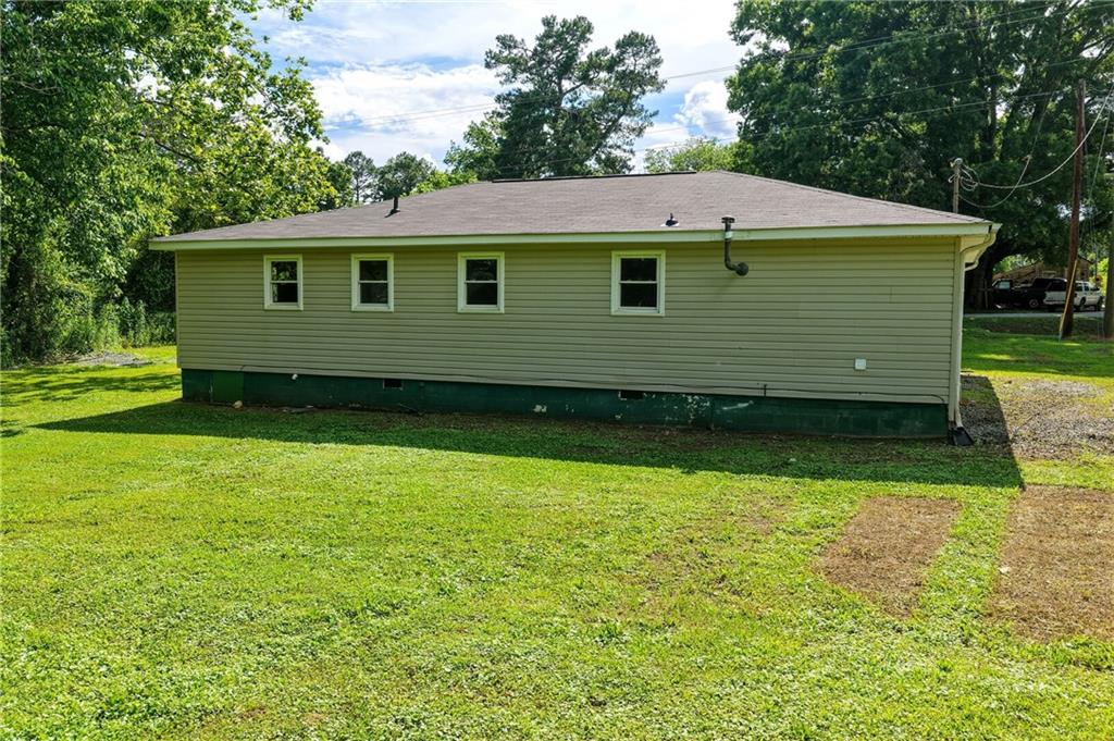 300 Cash Town Road Aragon, GA 30104 - Photo 27 of 28 a aerial view of a house next to a yard