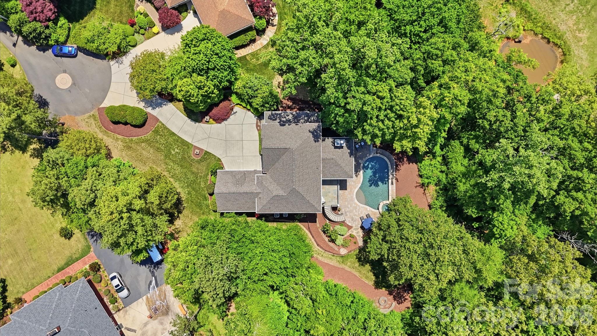 235 Grey Road Davidson, NC 28036 - Photo 41 of 42 an aerial view of a house with a yard