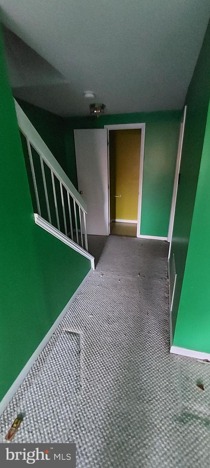 9051 Centerway Road Gaithersburg, MD 20879 - Photo 23 of 27 basement hallway
