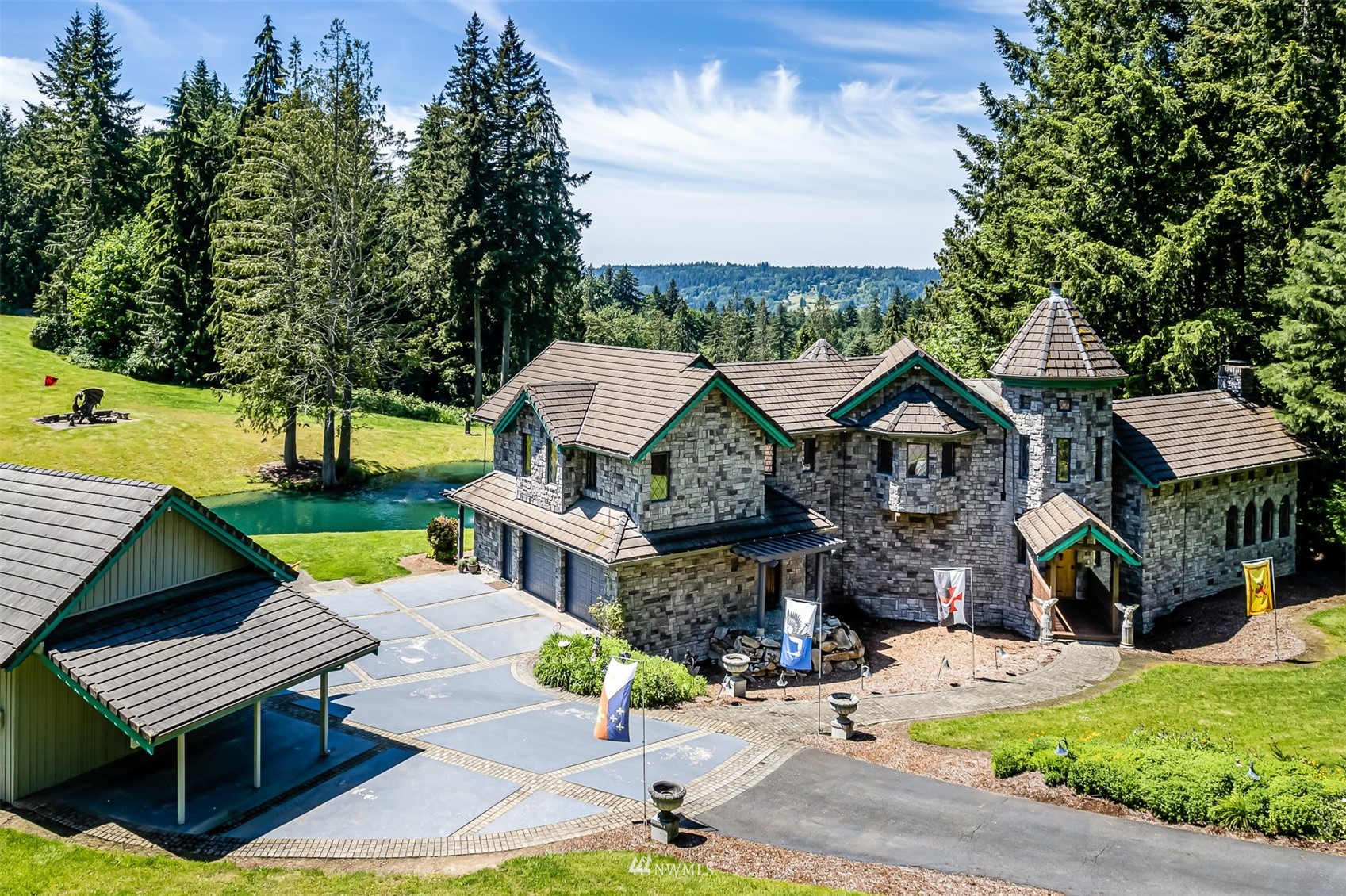21632 High Rock Road Monroe, WA 98272 - Photo 1 of 40 an aerial view of a house with garden space and street view