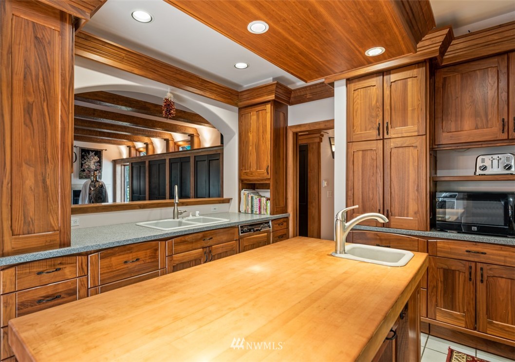 21632 High Rock Road Monroe, WA 98272 - Photo 14 of 40 a view of a kitchen with a sink and cabinets