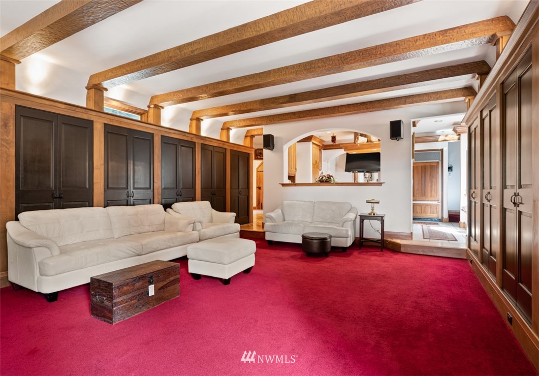 21632 High Rock Road Monroe, WA 98272 - Photo 17 of 40 a bed room with a bed and a couch