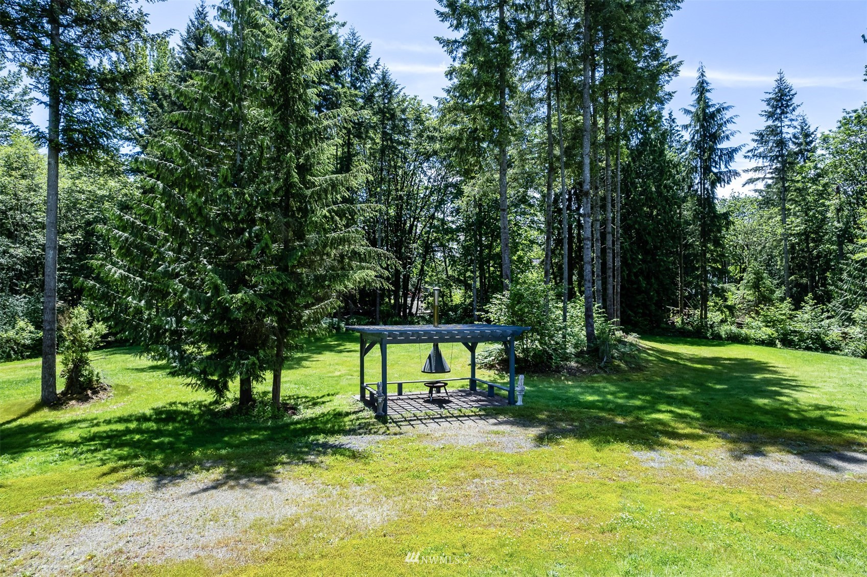 21632 High Rock Road Monroe, WA 98272 - Photo 31 of 40 a view of a house with a yard