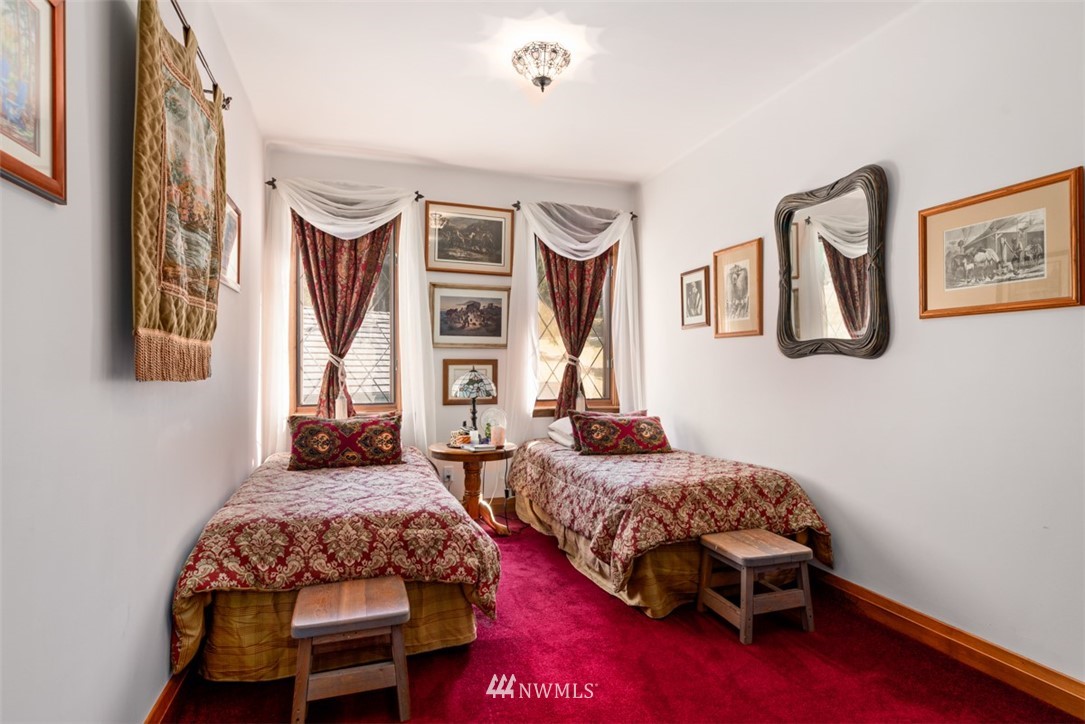 21632 High Rock Road Monroe, WA 98272 - Photo 8 of 40 a bedroom with furniture and a window