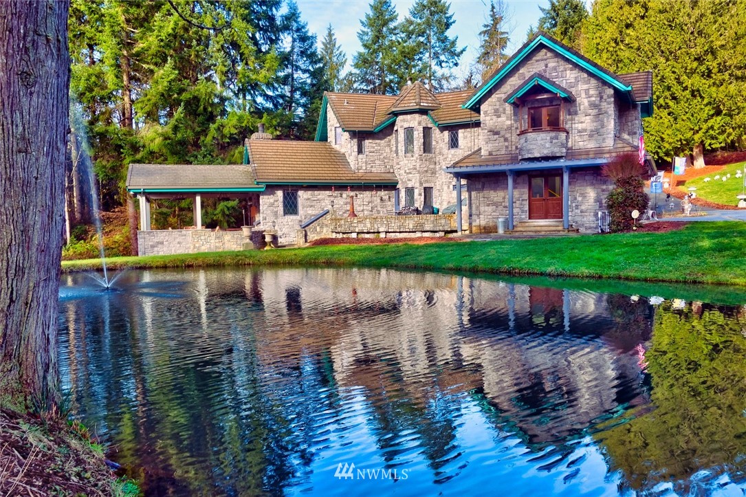 21632 High Rock Road Monroe, WA 98272 - Photo 10 of 40 a front view of a house with a yard