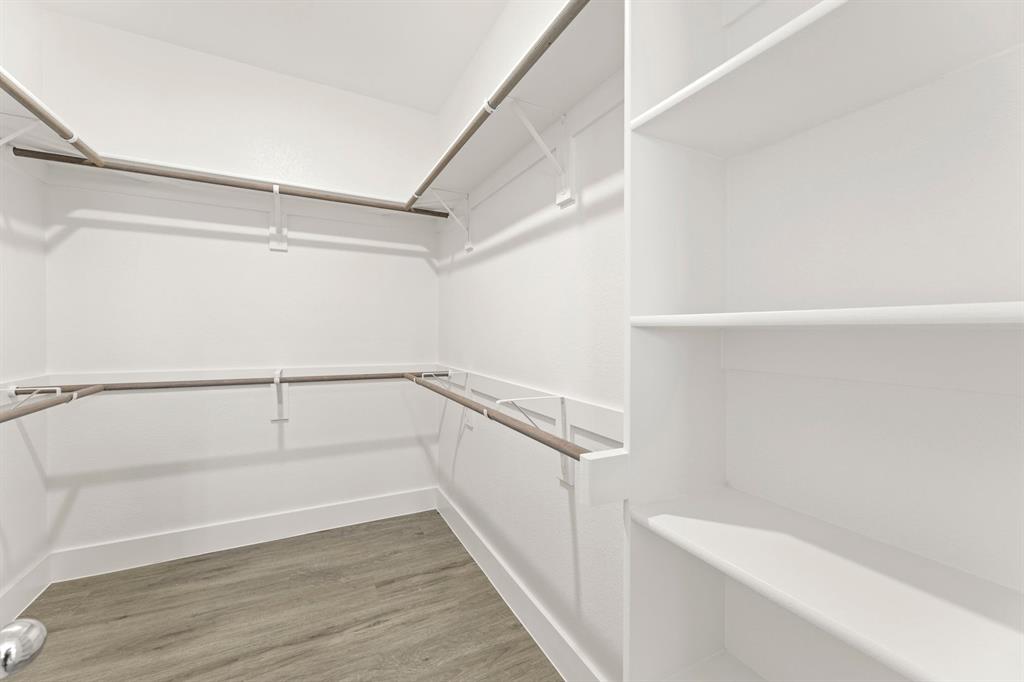 2372 Bell Way Forney, TX 75126 - Photo 24 of 39 a view of an empty walk in closet