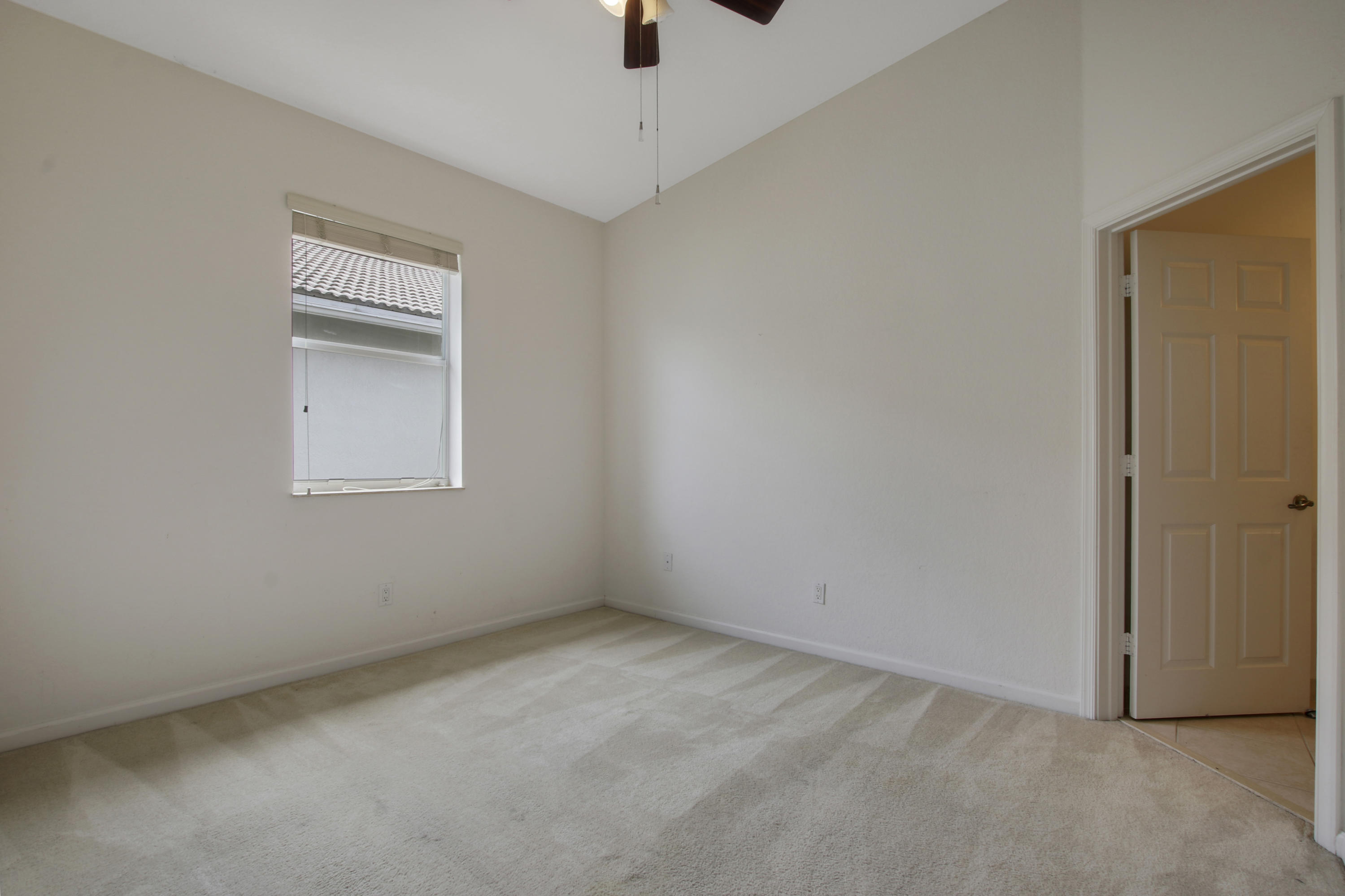 3111 Laurel Ridge Circle Riviera Beach, FL 33404 - Photo 18 of 30 Guest bedroom/second master