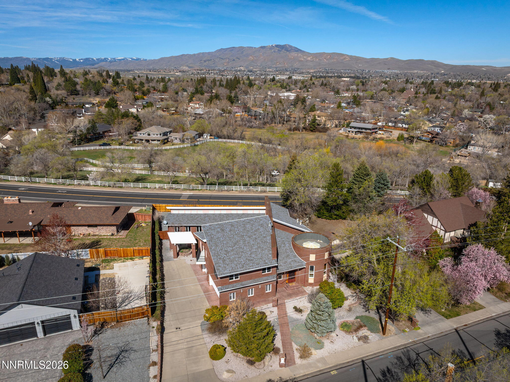 2425 Foley Way Reno, NV 89509 - Photo 12 of 73 an aerial view of residential houses with outdoor space and trees